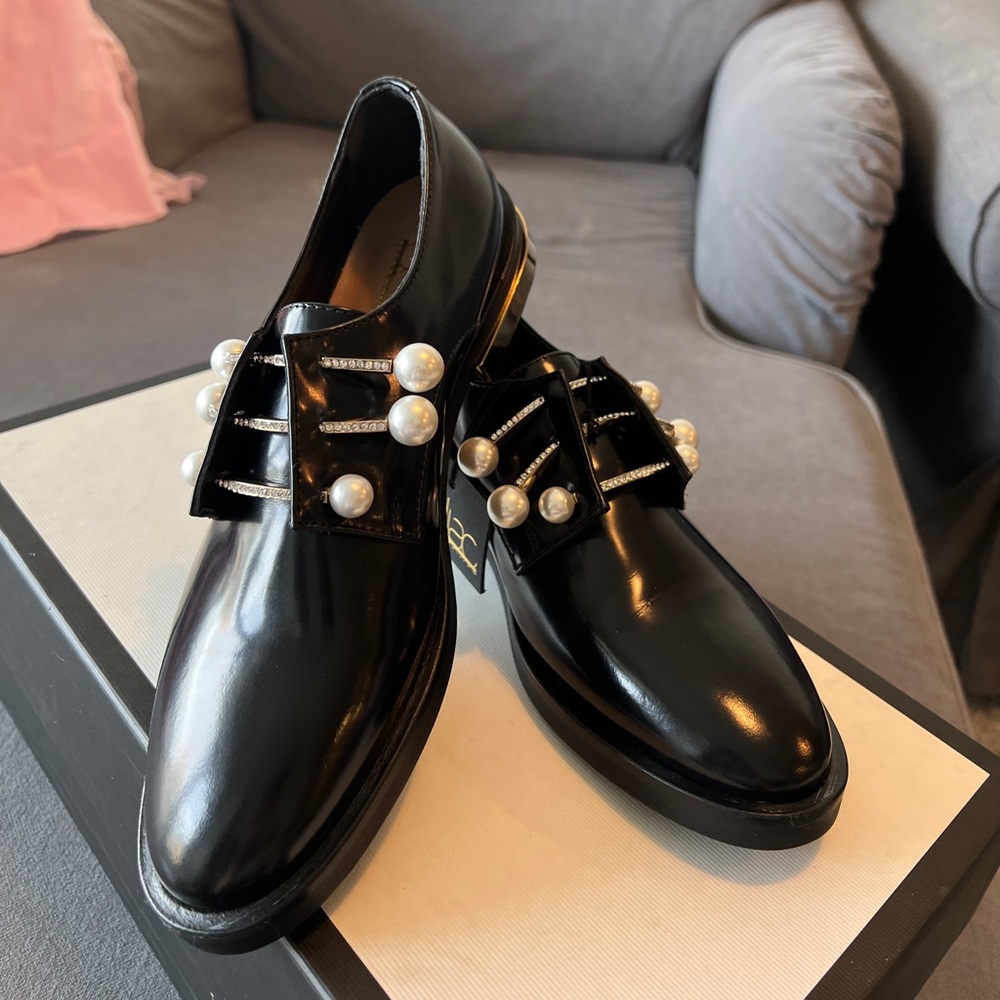 Brand new stylish Coliac loafer with pearl and crystal.